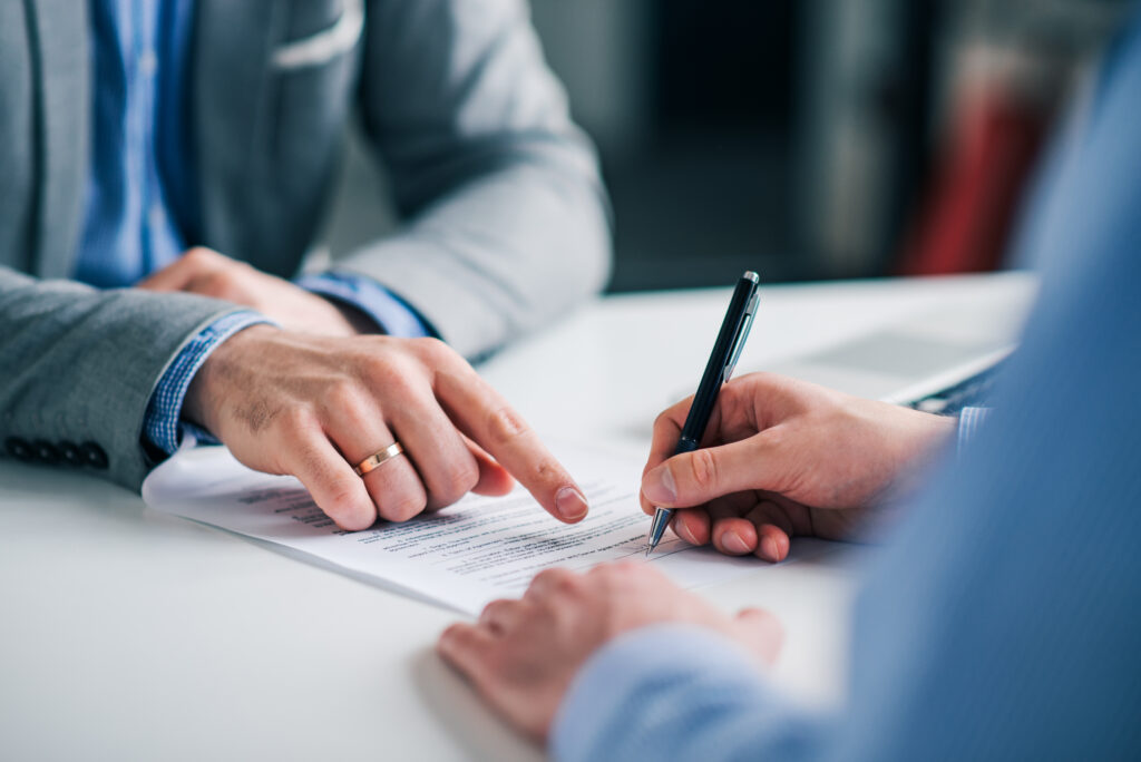 security services employees signing contract for job placement in austin, tx